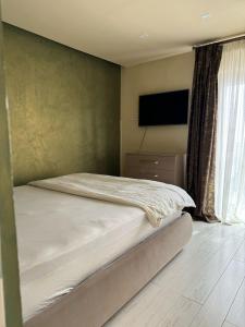 Postel nebo postele na pokoji v ubytování Craiova Mc