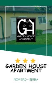 a sign for a garden house apartment in front of a house at Garden House Novi Sad in Novi Sad