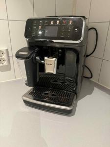 a coffee maker sitting on top of a counter at Northern Lights View Beautiful Berg in Kuberg