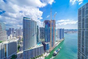 an aerial view of a city with tall buildings at GORGEOUS VIEWS Luxury Miami Brickell Pool Gym Spa in Miami