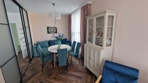Ruang duduk di Audronašos apartamentai - self cheking- Gargžduose +13 gambar