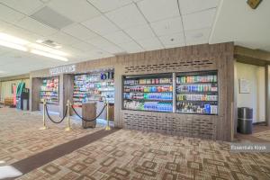 a store with shelves of books on the wall at MGM Signature 31st Flr , Strip View in Las Vegas