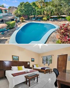 a hotel room with a large swimming pool at Drift Inn Cayo in Santa Elena