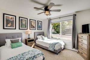 a bedroom with two beds and a window at Mtn Bikers Escape! 7 Mi to Kokopelli Loops Trails in Fruita