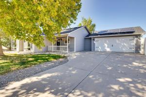 a house with a driveway and a garage at Mtn Bikers Escape! 7 Mi to Kokopelli Loops Trails in Fruita
