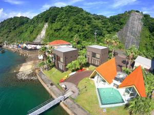 an aerial view of a house in the water at Kaamlanai Harbor - Vacation STAY 48682v in Nichinan +30 photos