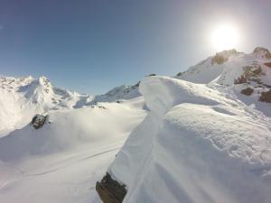 a pile of snow on top of a snow covered mountain at Arpege Des Neiges in Sainte-Foy-Tarentaise