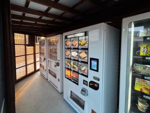 a refrigerator in a store with food in it at oceanhouse iseshima - Vacation STAY 67855v in Kō