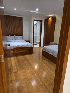 Postel nebo postele na pokoji v ubytování Magic Horizon Suite