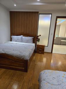 Postel nebo postele na pokoji v ubytování Magic Horizon Suite