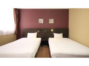 เตียงในห้องที่ Smile Hotel Otsu Seta - Vacation STAY 00134v +25 ภาพ