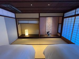 a room with a view of a room with a window at Tsubaki to Kotoha - Vacation STAY 09361v in Obama +34 photos