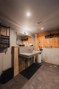 a bathroom with a sink and a mirror at Casa CarpeDiem - Vacation STAY 09135v in Ichinomiya