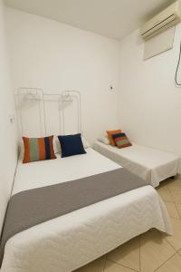 Katil atau katil-katil dalam bilik di Quarto Privativo, Area Nobre, no coração de Belem, Central de Ar e Wi-fi, - Terreo1