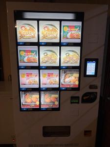 a vending machine with pictures of food on it at Minpaku Gozamisaki - Vacation STAY 23481v in Goza