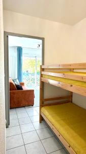 Postel nebo postele na pokoji v ubytování La Cabane aux Mouettes