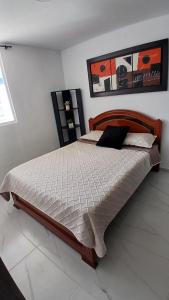 Postel nebo postele na pokoji v ubytování apartamento descanso villeta + 4 fotografie