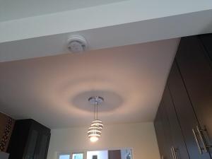 a ceiling with a light hanging from a ceiling at Residence in Cuautla 