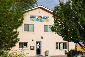 a building with a sign on the side of it at JW Grand Junction in Grand Junction