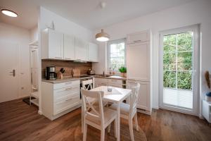 Η κουζίνα ή μικρή κουζίνα στο Ferienhaus Strandgold