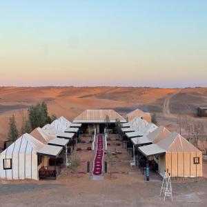 an aerial view of a building in the desert at Starlight Erg Luxury Camp in Merzouga