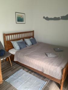Postel nebo postele na pokoji v ubytování Baladise Apartman