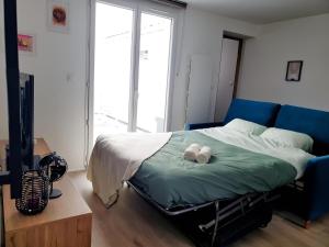 Giường trong phòng chung tại La Petite traversière