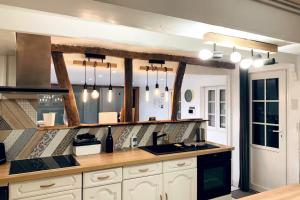 Dapur atau dapur kecil di Le Cocon de la Mare