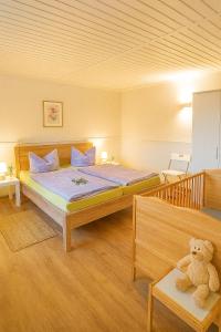 Postel nebo postele na pokoji v ubytování Ferienhaus am Neuklostersee