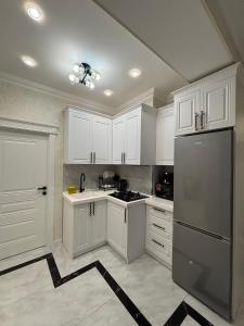 Η κουζίνα ή μικρή κουζίνα στο Smart Dom Apartments Baku