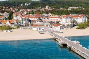 an aerial view of a beach with a pier at Sheraton Sopot Hotel in Sopot