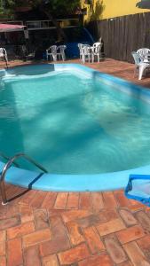 Kolam renang di atau dekat dengan Hotel e Pousada Vó Márcia