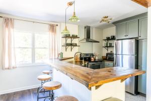 a kitchen with a large wooden counter top at Beech Mountain Escape with Views in Beech Mountain