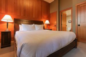 Giường trong phòng chung tại Slalom Creek 3 Bedrooms