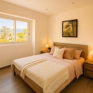a bedroom with a large bed and a window at Luna Rossa in Piana +2 photos