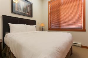 Katil atau katil-katil dalam bilik di Slalom Creek 3 Bedroom +13 gambar