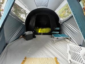 an inside of a tent with a table in it at Ko Glamping in Valdivia