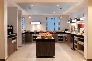 a large kitchen with a island in the middle at Hampton by Hilton Cartagena in Cartagena de Indias
