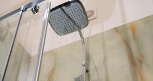 a shower head with water coming out of it at Atmosfere 19 in Sant'Egidio del Monte Albino