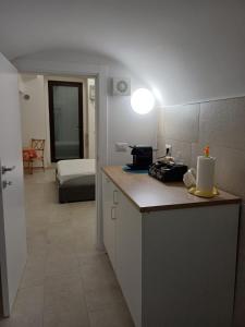 Una cocina o cocineta en Dimora Marte