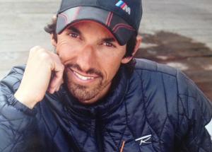 a man wearing a hat and a jacket at Arpege Des Neiges in Sainte-Foy-Tarentaise