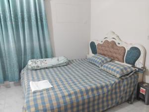 Ένα ή περισσότερα κρεβάτια σε δωμάτιο στο Peacefully