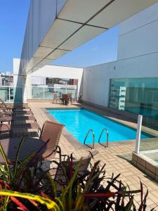 Πισίνα στο ή κοντά στο Praia do Canto Apart Hotel - 102B