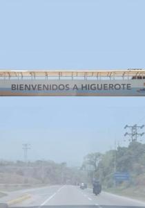 a train on a bridge over a highway at Villa en higuerote in Higuerote +5 photos