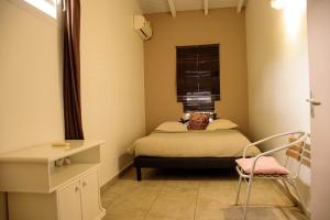 Giường trong phòng chung tại Eden Sea Villa