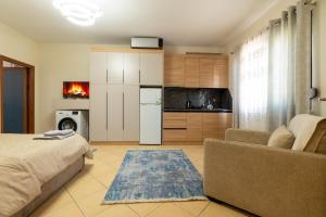 Posezení v ubytování Mandi Apartament