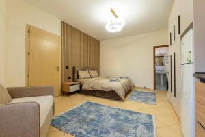 Postel nebo postele na pokoji v ubytování Mandi Apartament