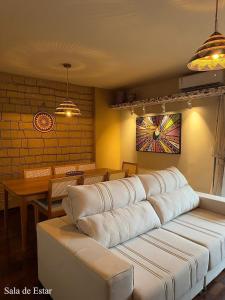 En eller flere senge i et værelse på Apartamento Amazonia Pura