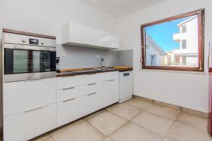 Η κουζίνα ή μικρή κουζίνα στο Seaside holiday house Privlaka, Zadar - 24940 +12 φωτογραφίες