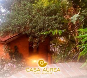 a sign that says casa aireura in front of a building at Casa Aurea Hotel Boutique in Morelia